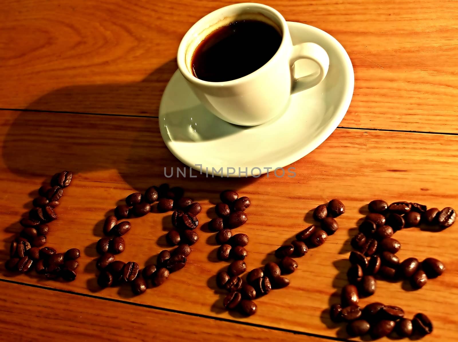 LOVE COFFEE made of coffee beans and espresso cup