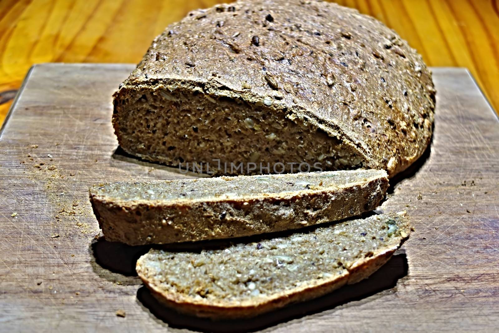 Freshly baked homemade brown bread with two slices