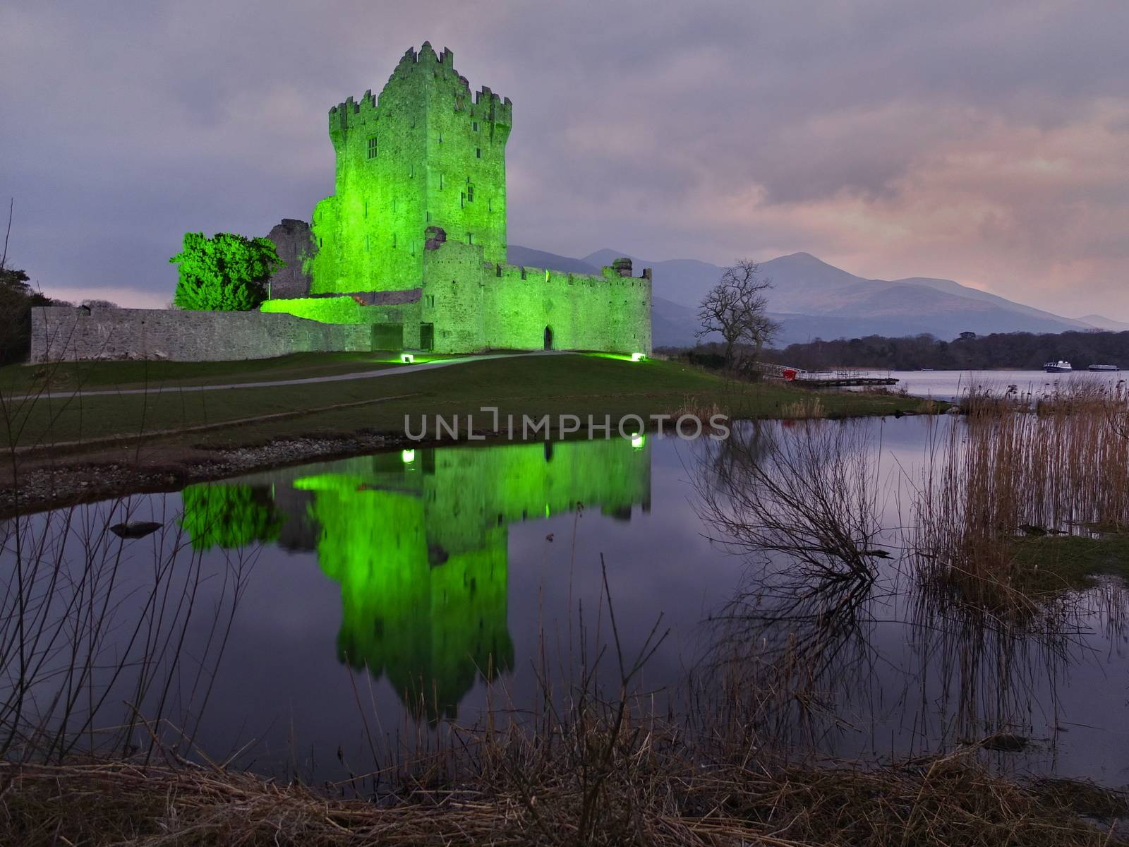 Ross Castle in Killarney National Park, Ireland. Evening view during Patrick day.