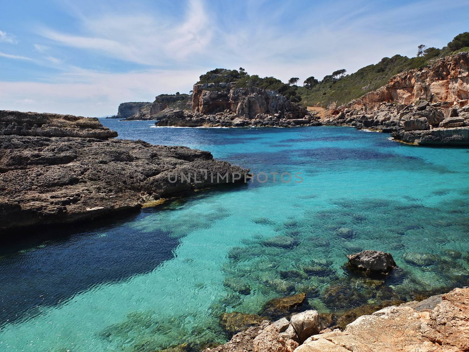 Cala Almonia beach, bay azure sea water, at Majorca in Spain