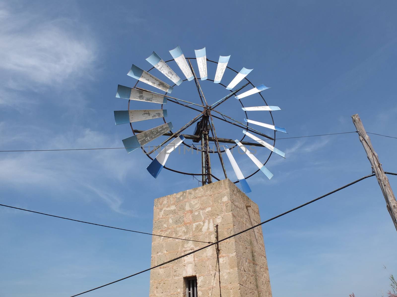Windmill at island of Majorca in Spain by antenacarnidlo