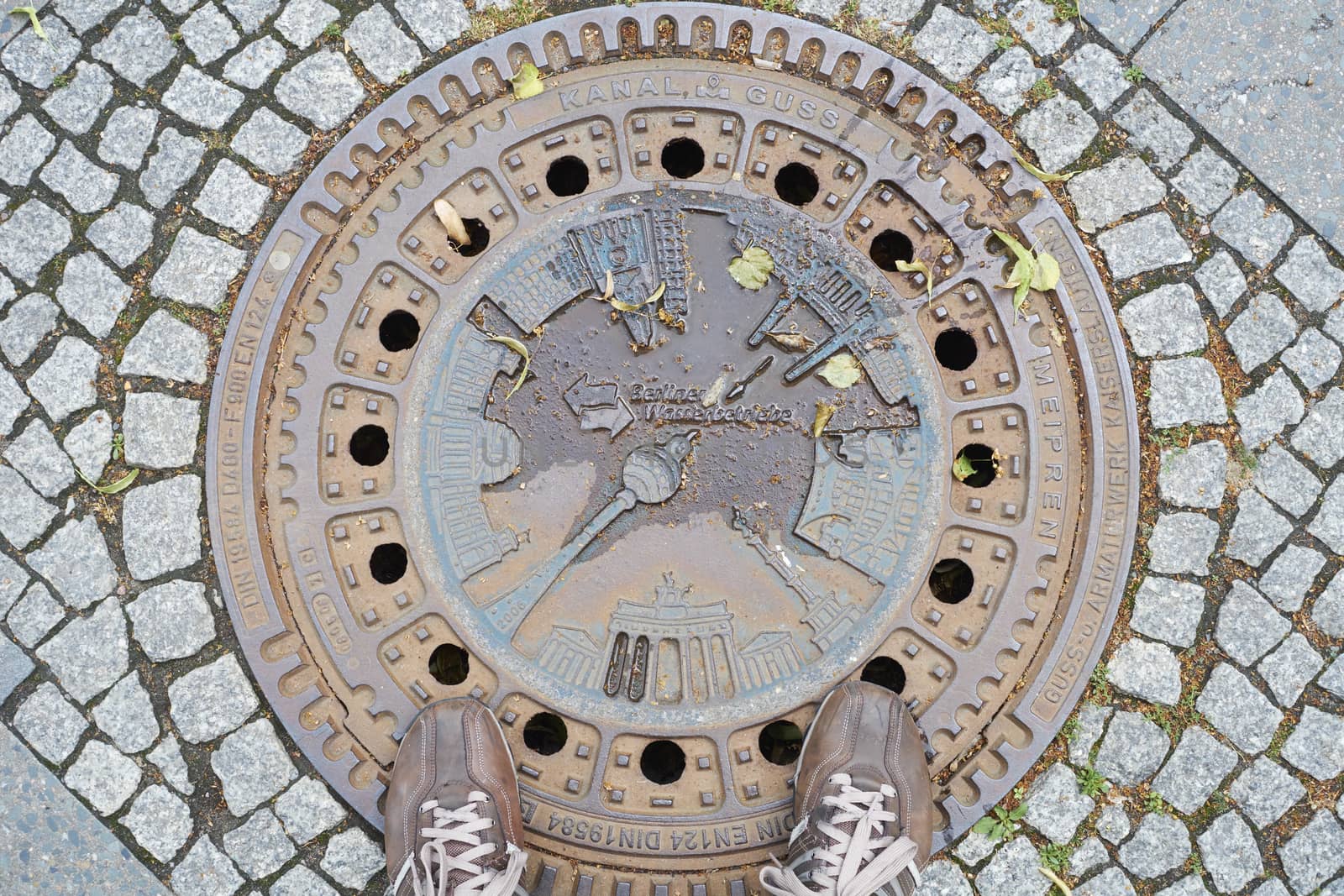 BERLIN, GERMANY - JULY 08: Berlin manhole cover design depicting TC tower and other landmarks. July 08, 2015 in Berlin.