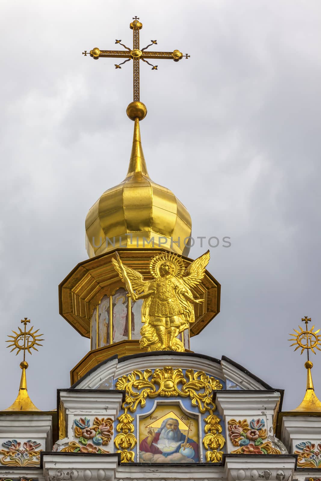 Saint Michael Monastery Cathedral Steeples Spires Facade Kiev Ukraine.  Saint Michael's is a functioning Greek Orthordox Monasatery in Kiev.  The original monastery was created in the 1100s but was destroyed by the Soviet Union in the 1930s.  St. Michaels was reconstructed after Ukrainian independencein 1991 and reopened in 1999.