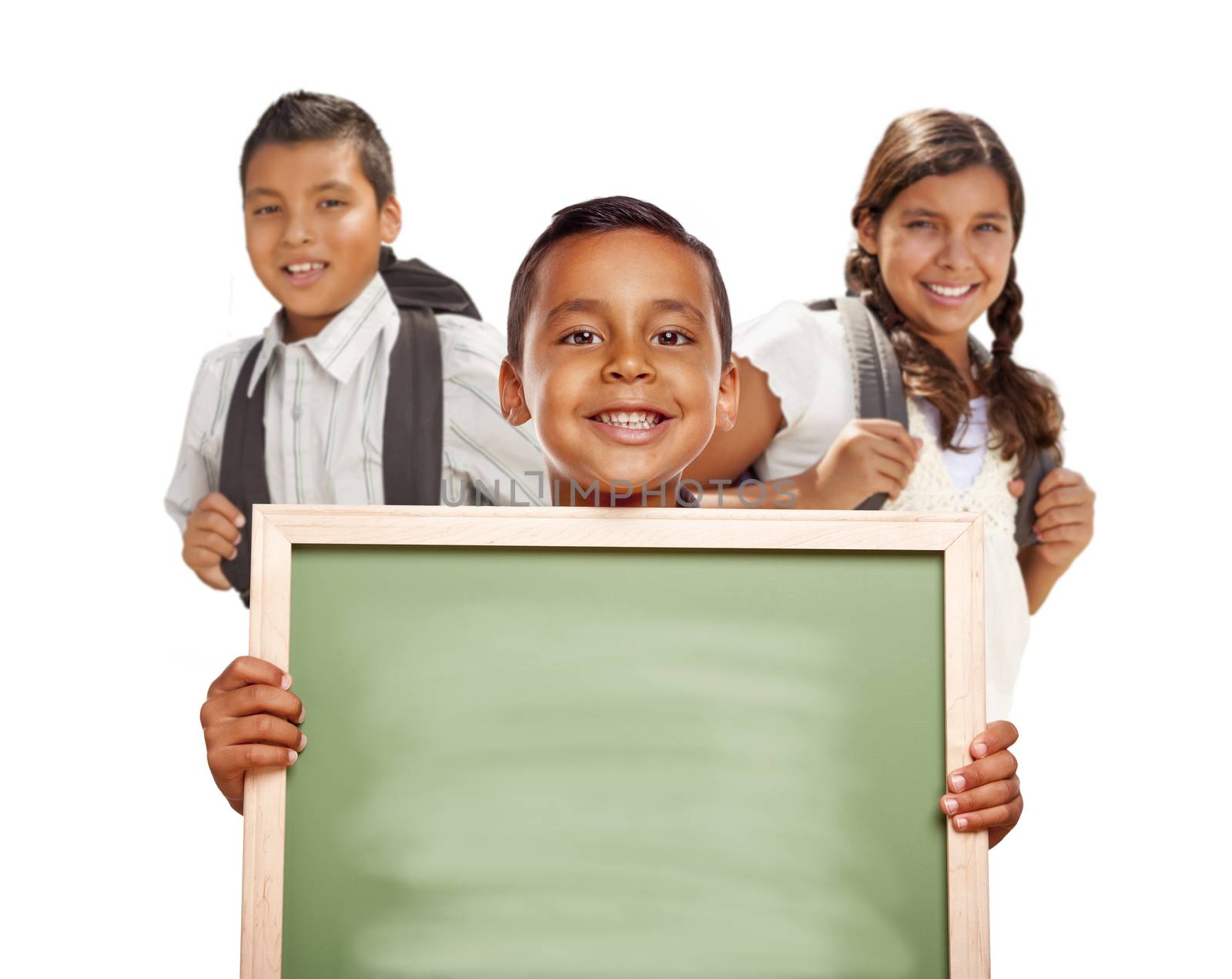 Smiling Happy Hispanic Boys and Girl Holding Blank Chalk Board Isolated on White.