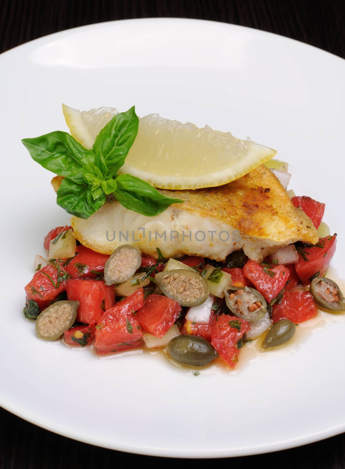 slice of baked fish perch with vegetables by Apolonia