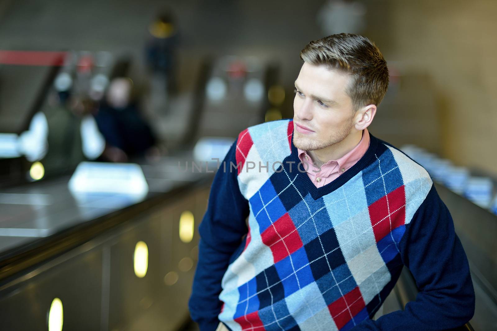 Portrait of a stylish young man sightseeing the city