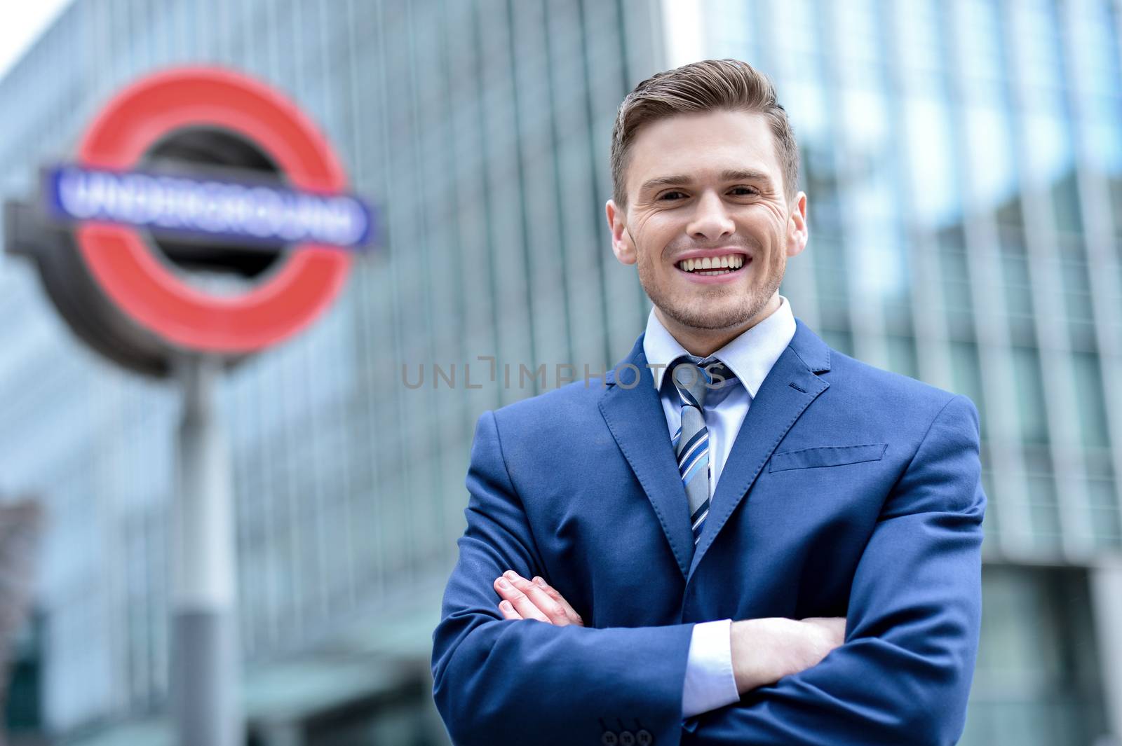 Portrait of a confident businessman posing outside skyscraper