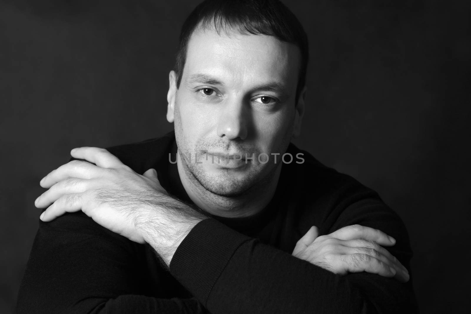 Studio portrait of man isolated on grey background