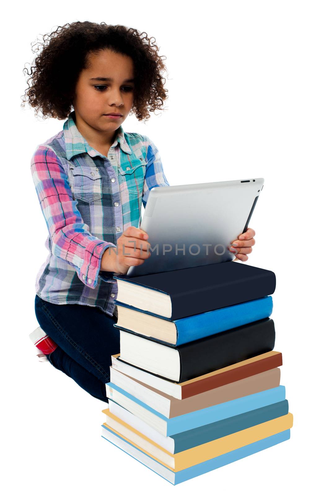 Cute girl with stack of books and tablet pc