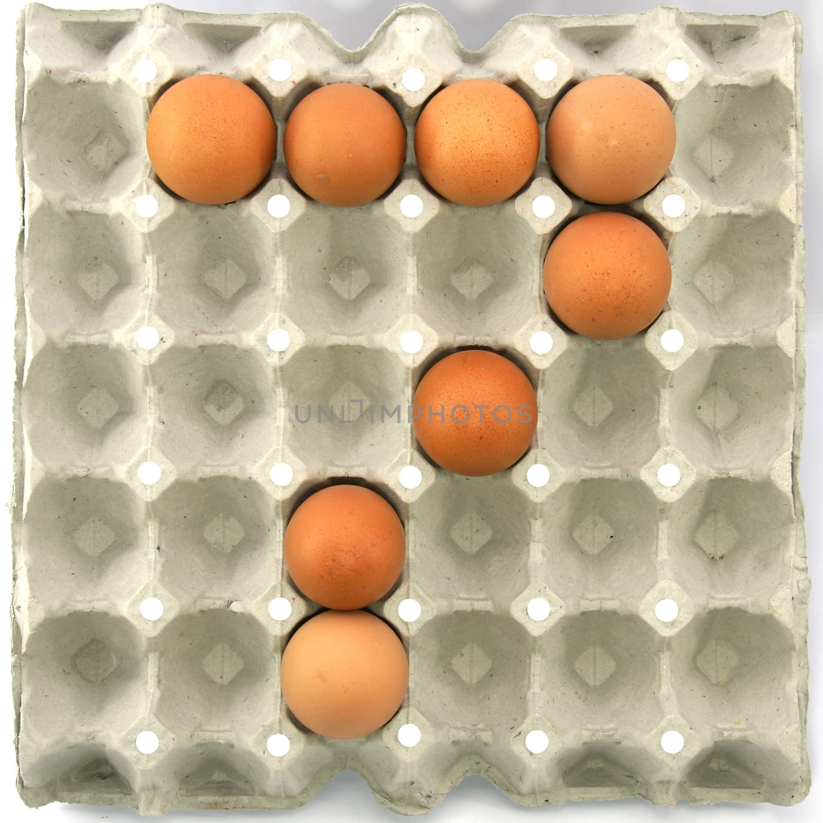 Number seven of eggs in the paper package tray by mranucha