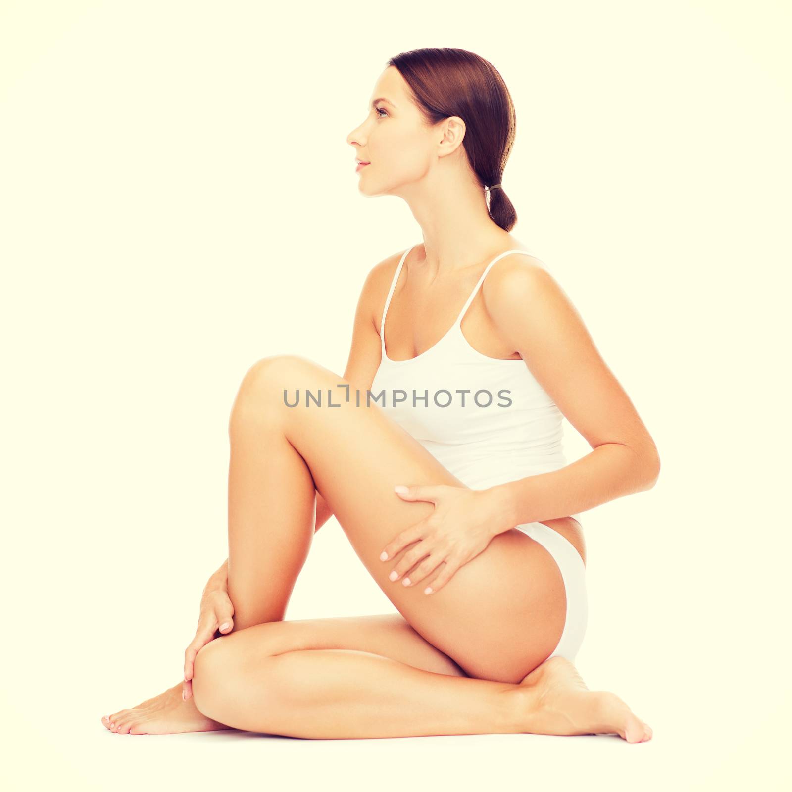 health and beauty concept - beautiful woman in white cotton underwear