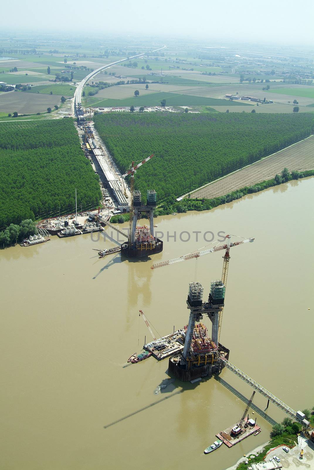 Aerial view of the construction of the bridge on the river