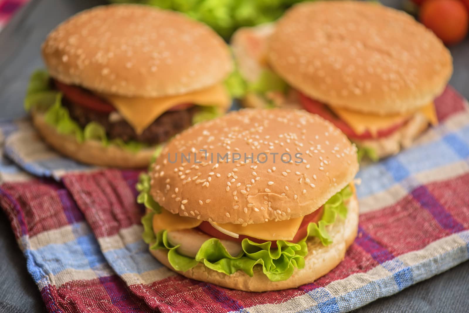 Closeup of home made burgers on wooden table
