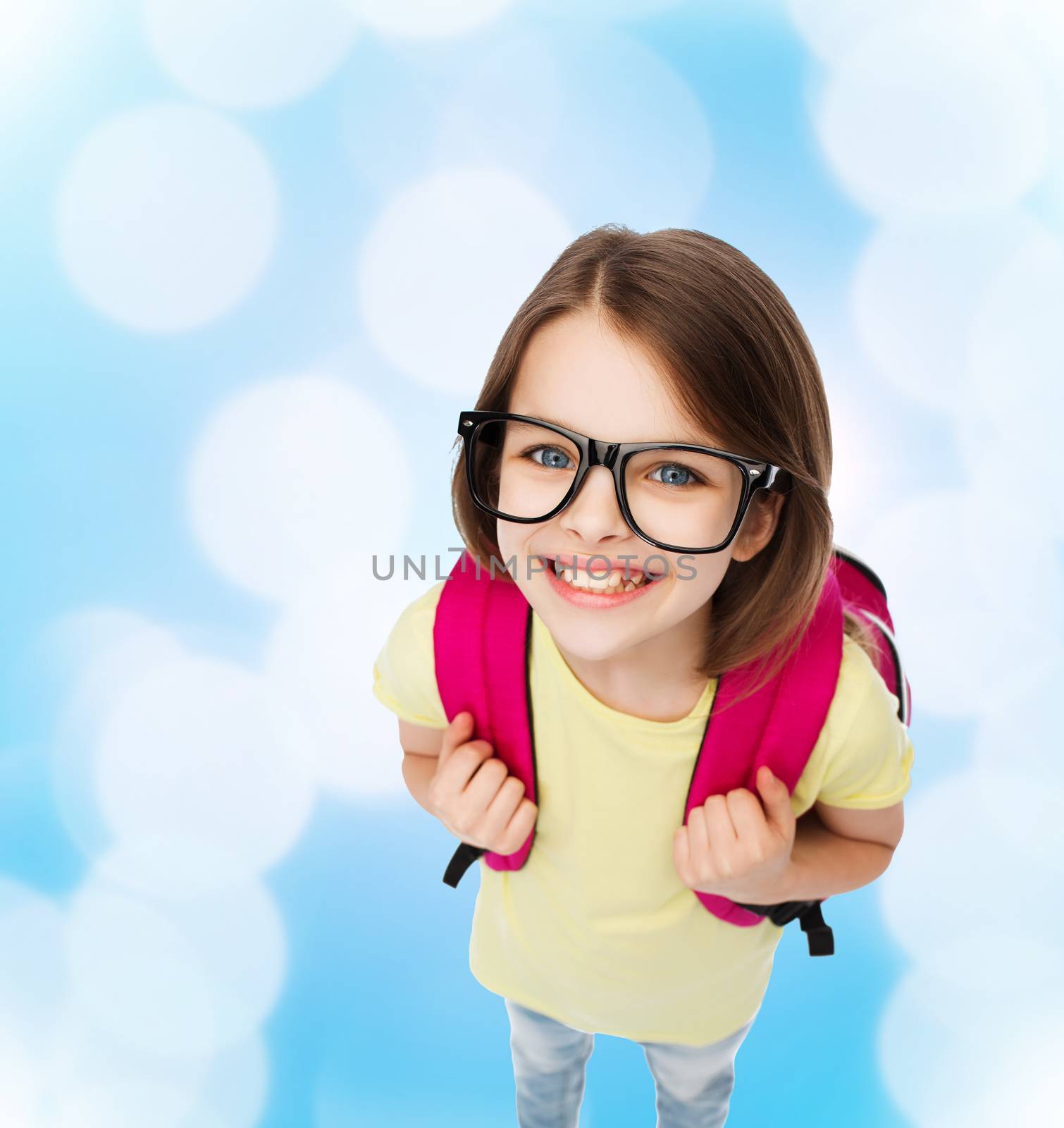 education and school concept - happy and smiling teenage girl in eyeglasses with bag