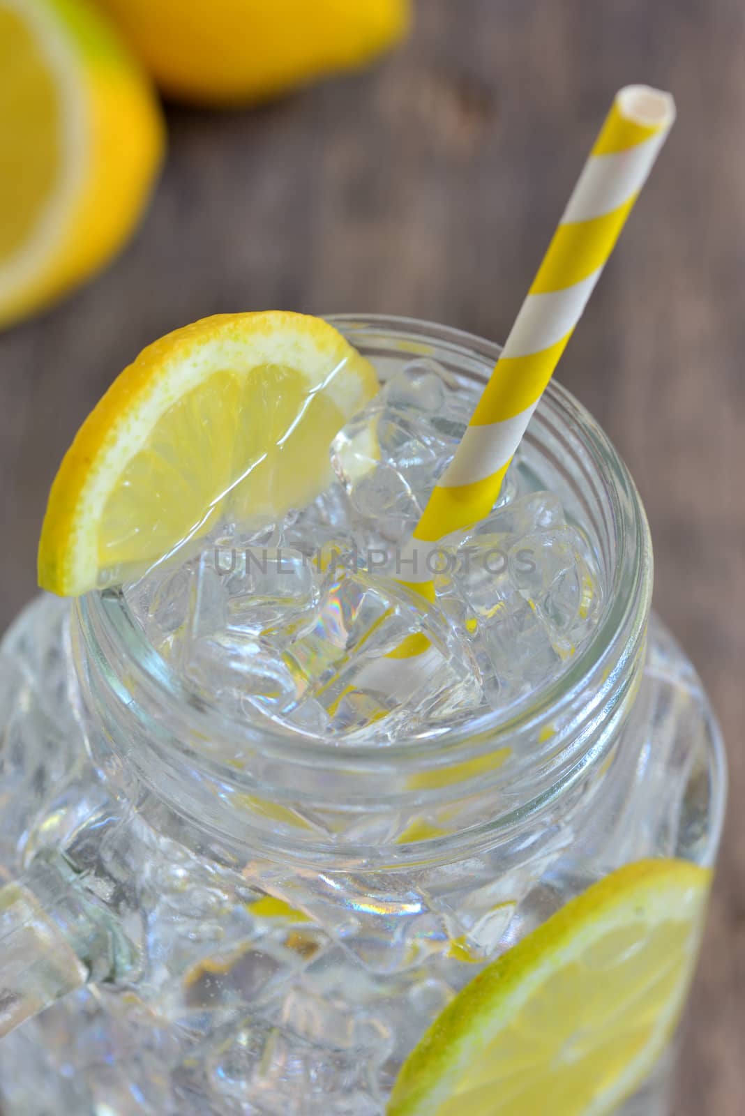 Glass of fresh water with  lemon