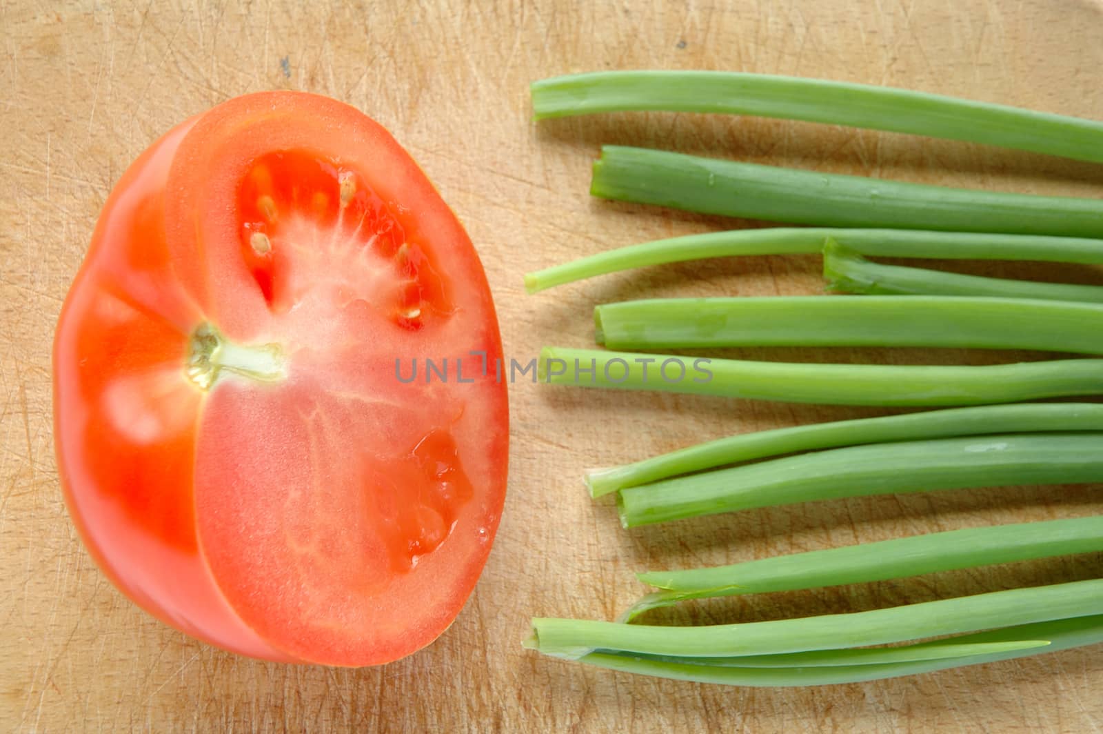 Vegetables on brown chopping board