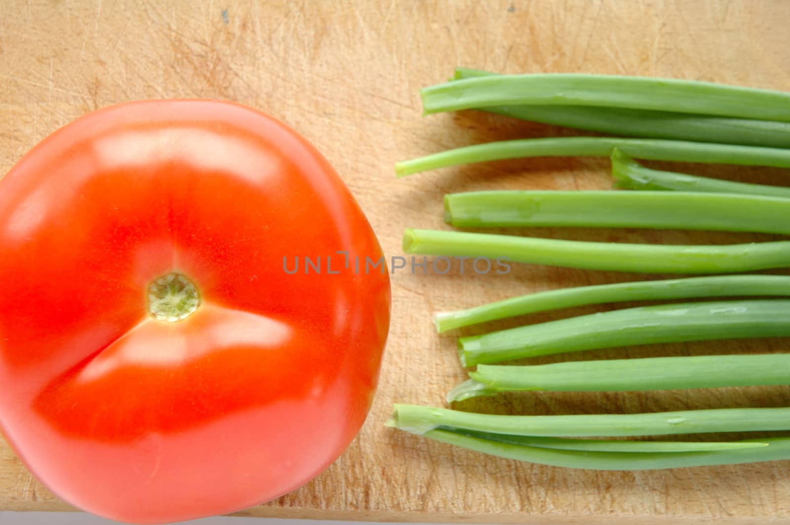 Vegetables on brown wooden chopping board