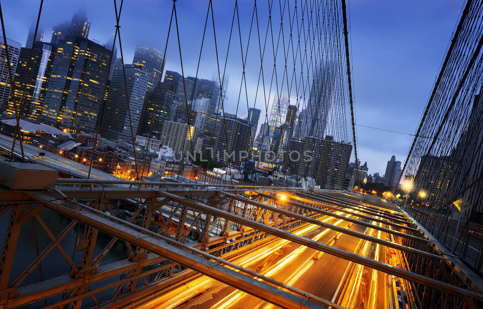 New York City - beautiful sunrise over manhattan with manhattan and brooklyn bridge USA