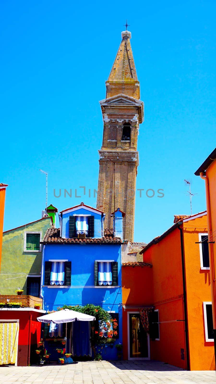 Burano churrch and colorful house, Venice, Italy