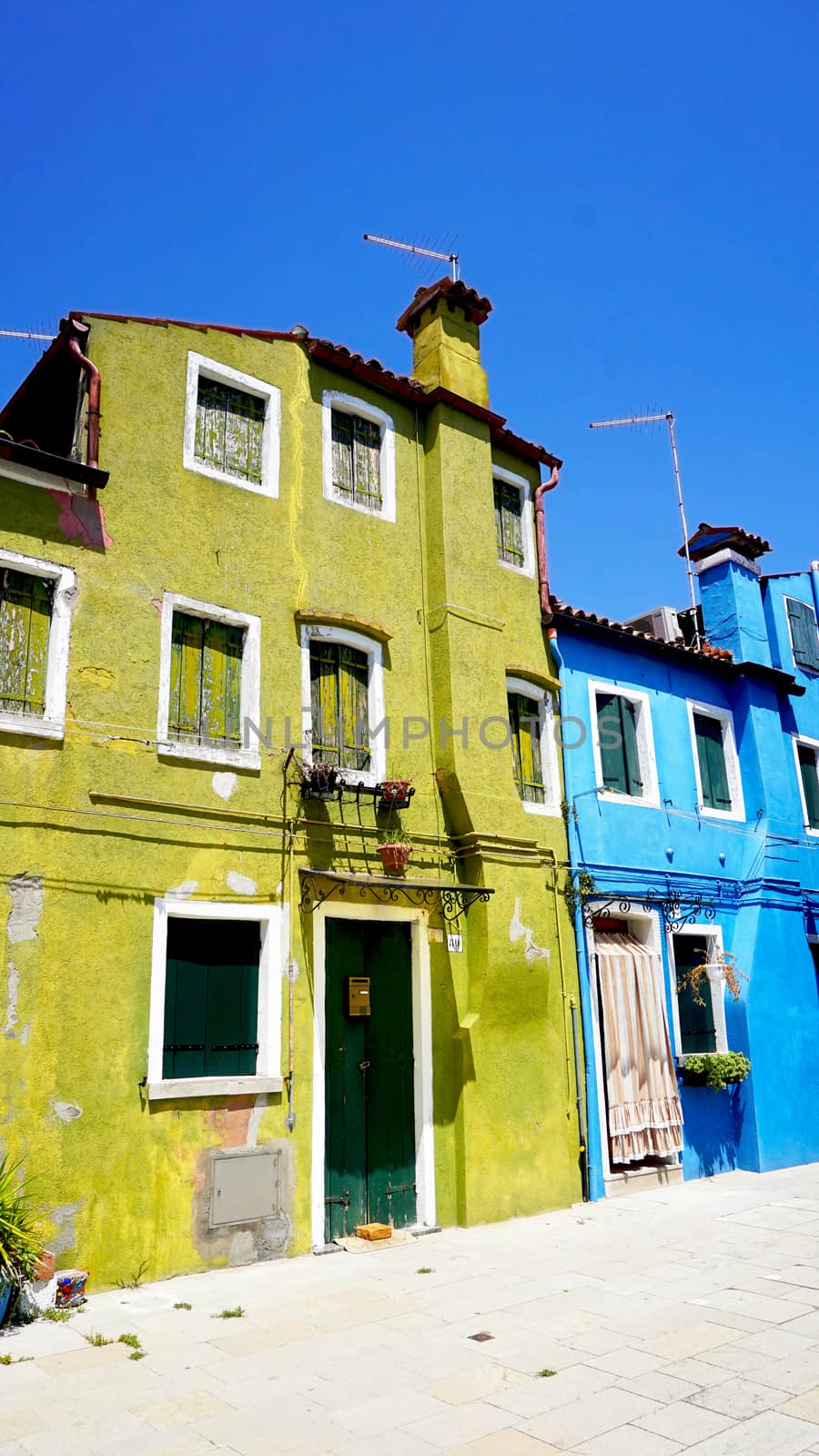 Burano colorful building architecture green and blue, Venice, Italy