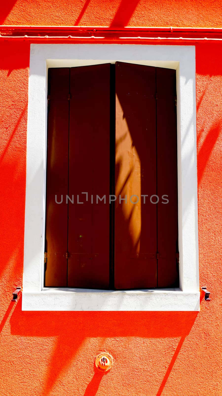 wooden Window on orange color wall by polarbearstudio