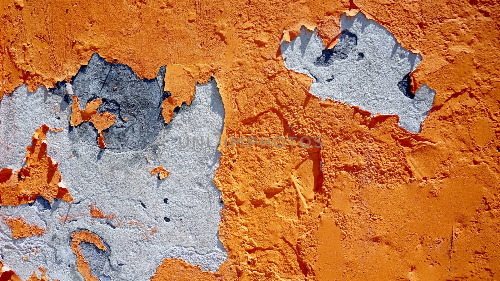 decay orange color wall in Burano, Venice, Italy