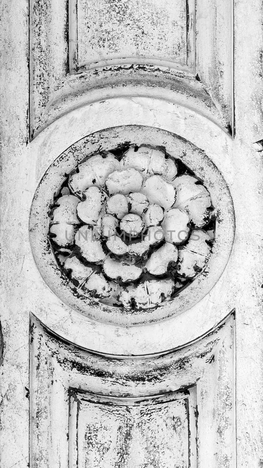 flower ornament on column of church greyscale in Murano, Venice, Italy