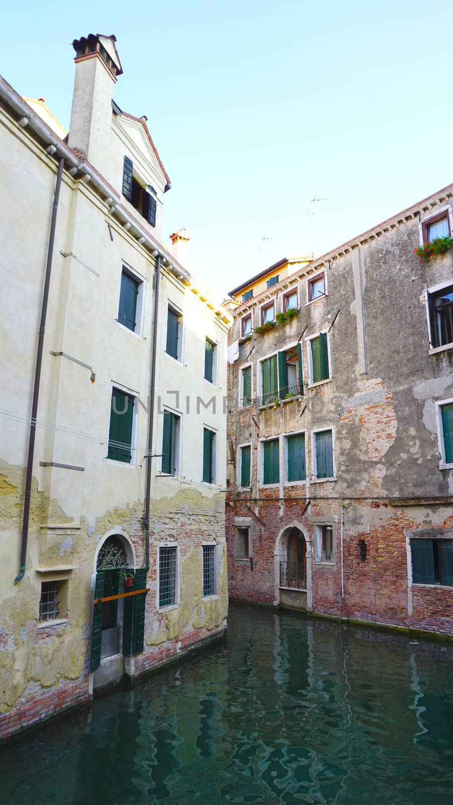 old buildings and canal in Venice, Italy