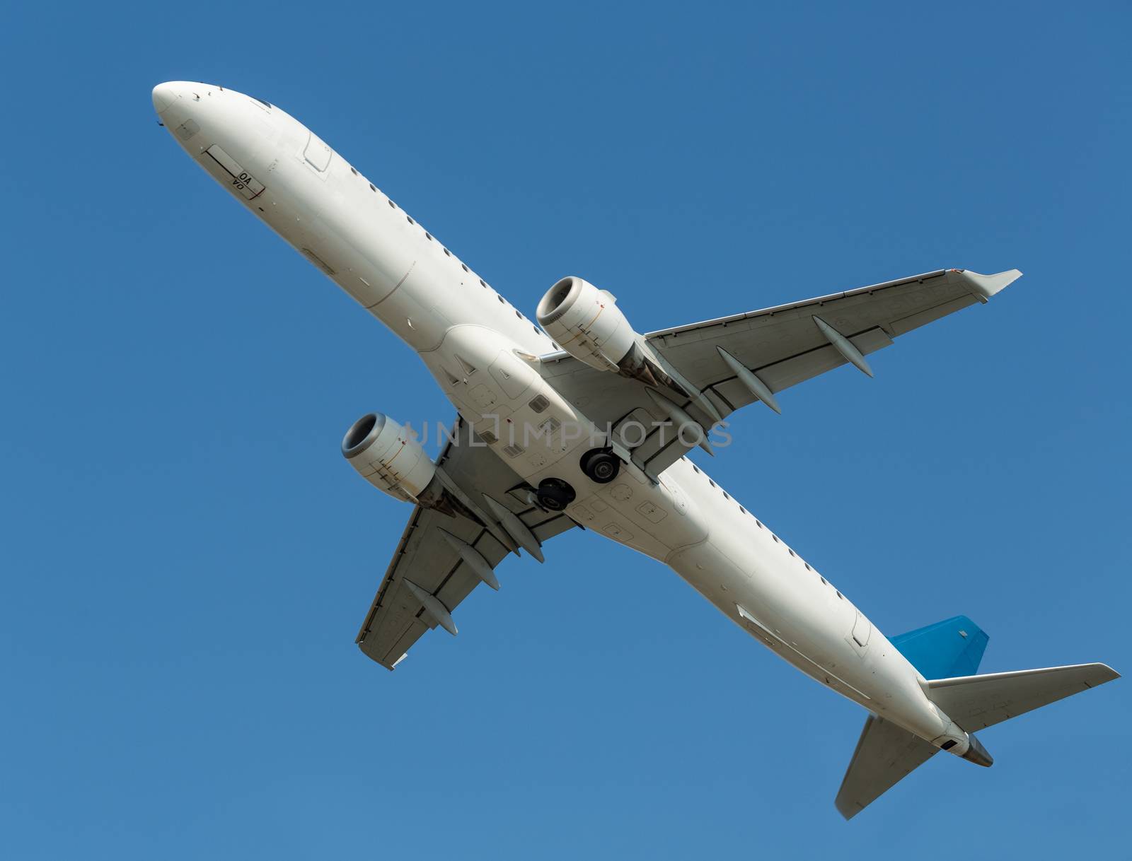 Airplane in the blue sky