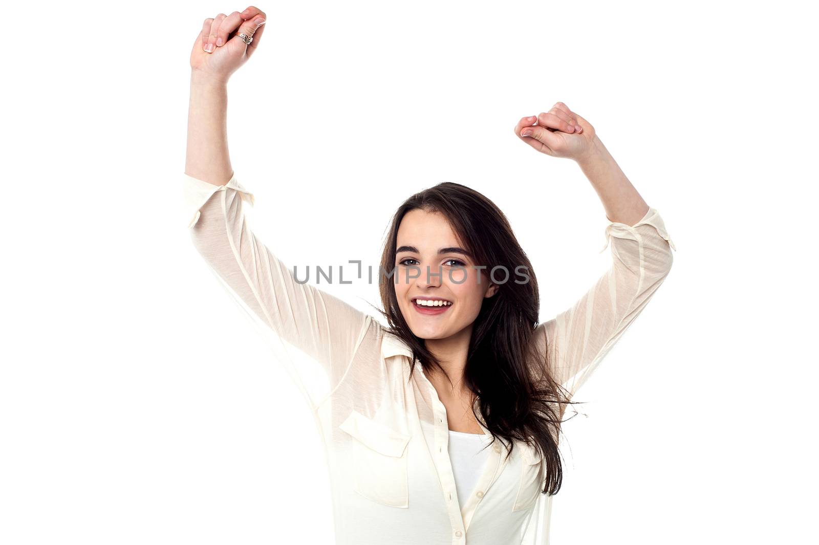 Happy teen girl dancing, isolated over white 