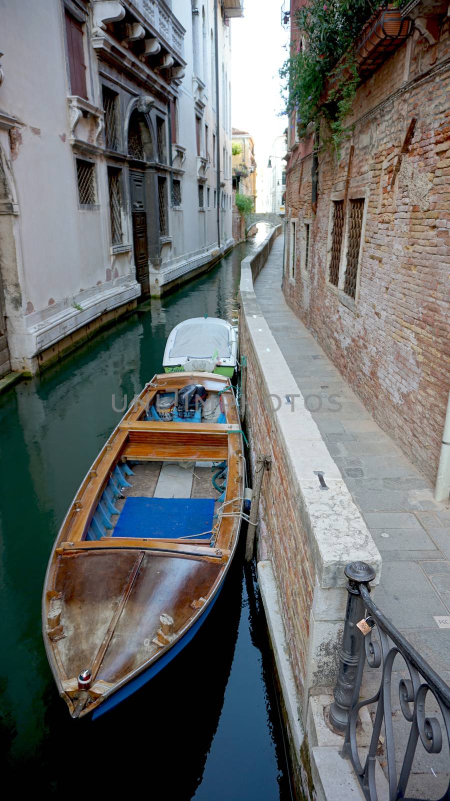 boat and canal Alleyway in Venice, Italy