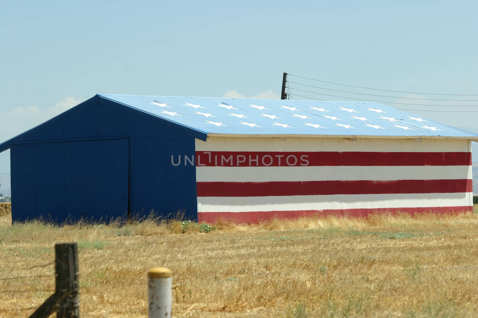 Big American flag painted on a warehouse