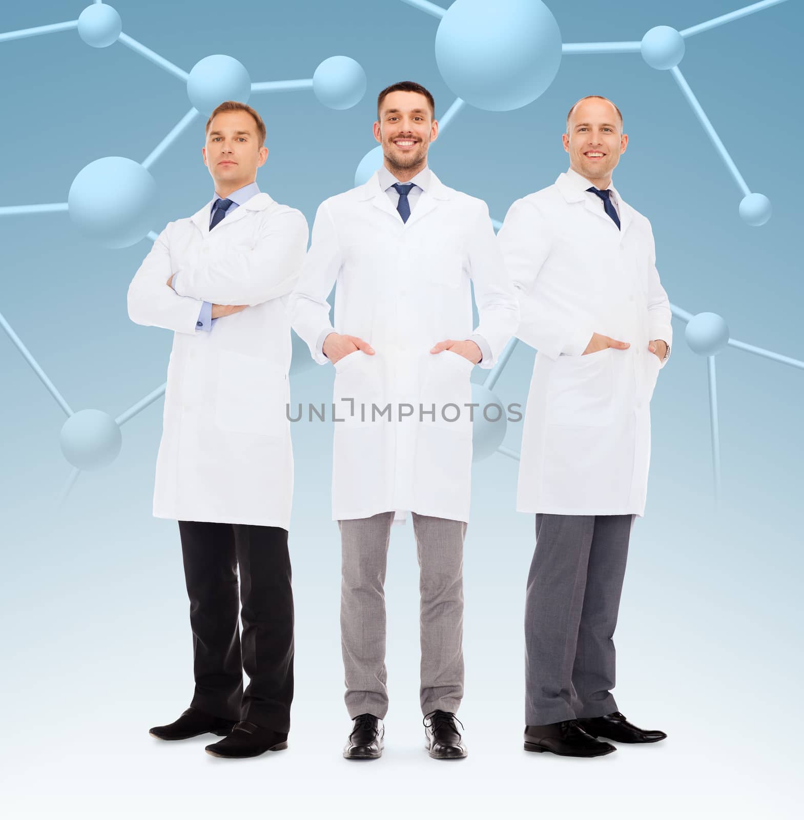 healthcare, profession, teamwork and medicine concept - group of smiling male doctors in white coats over blue molecular background
