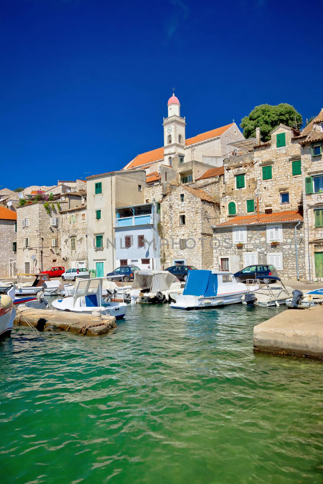 Sibenik green sea and blue sky, traditional architecture view, Dalmatia, Croatia