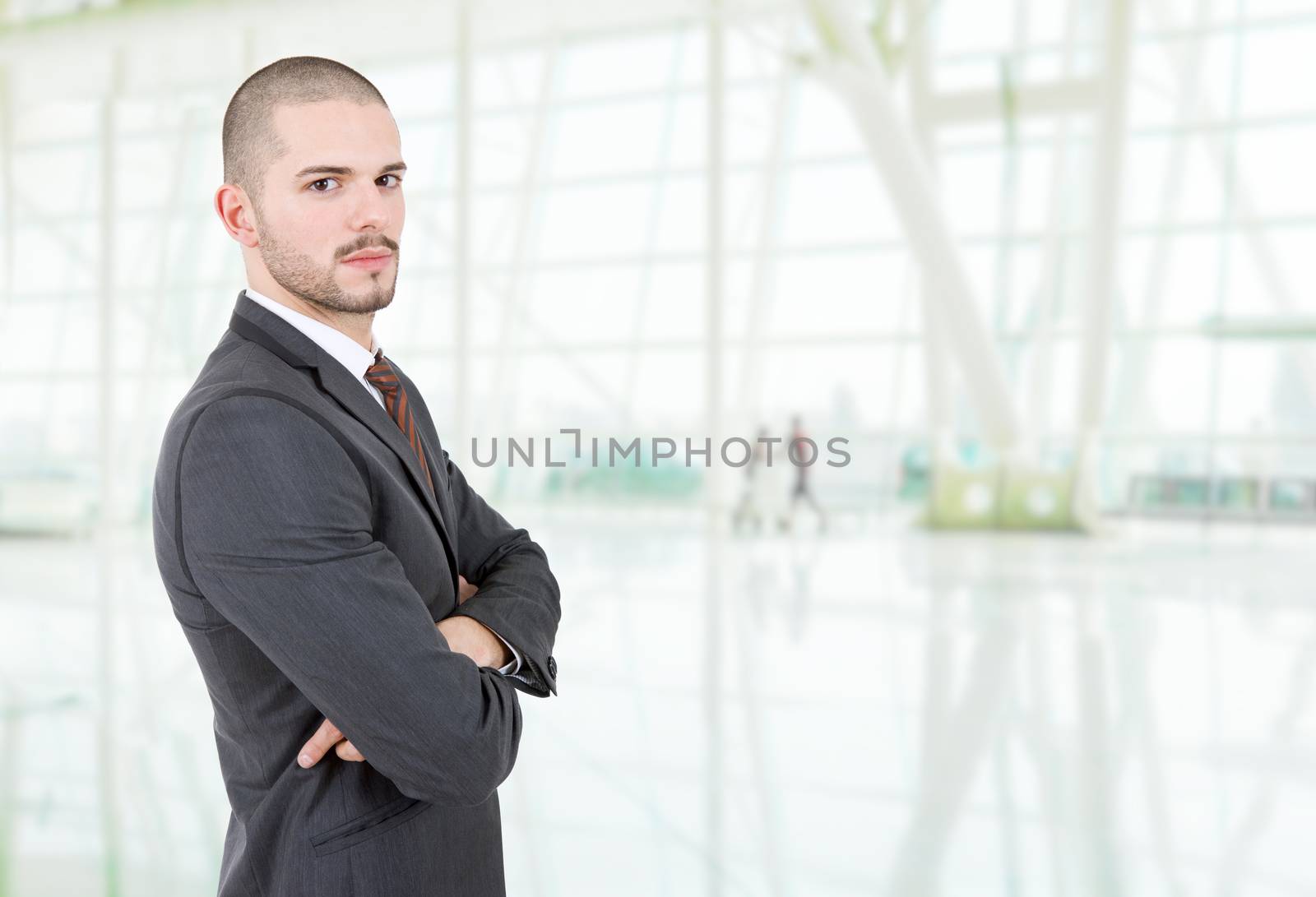 young business man portrait at the office