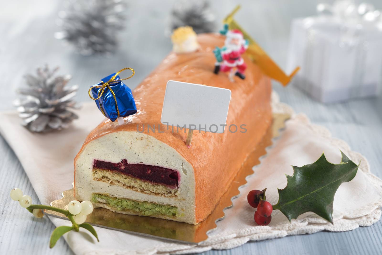 Yule log of white chocolate mousse, stuffed with raspberry puree by JPC-PROD