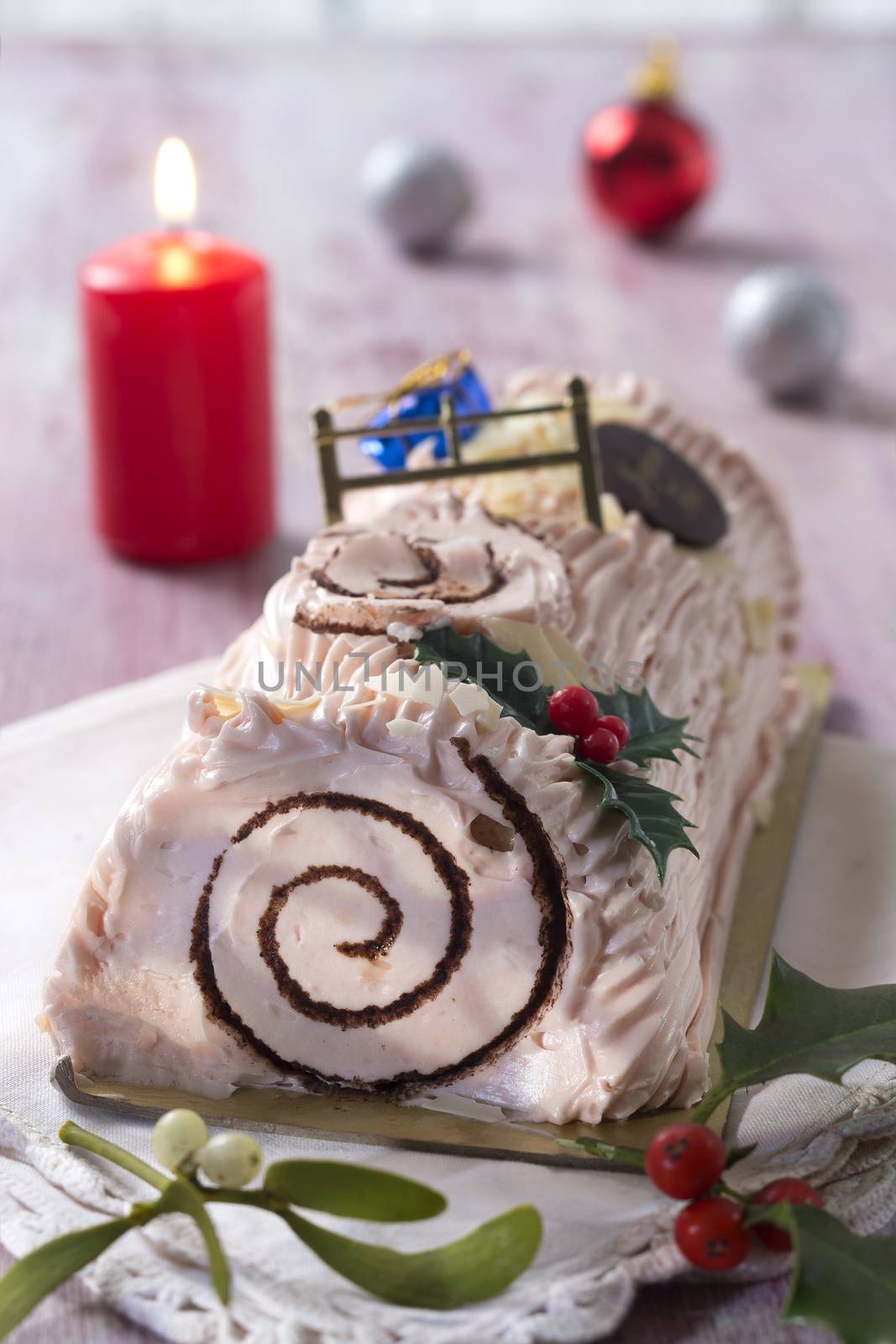 a yule log cake, traditional of christmas time dough with white chocolate  cream by JPC-PROD