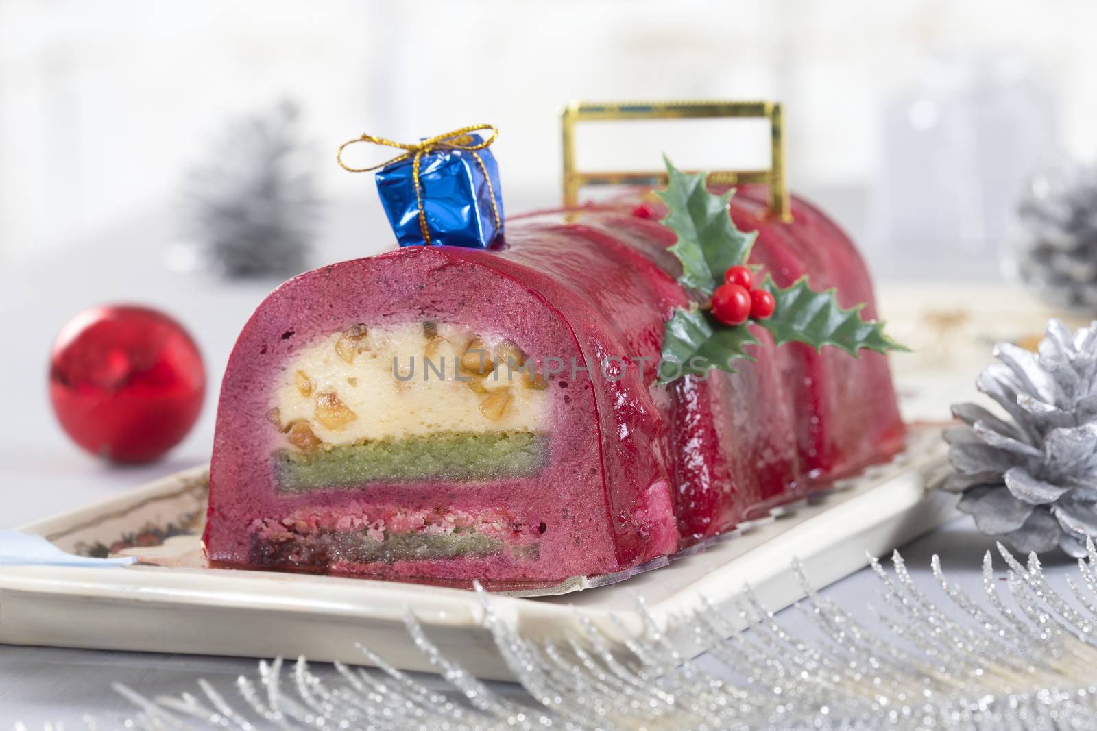 Chocolate swiss roll cake with red berries