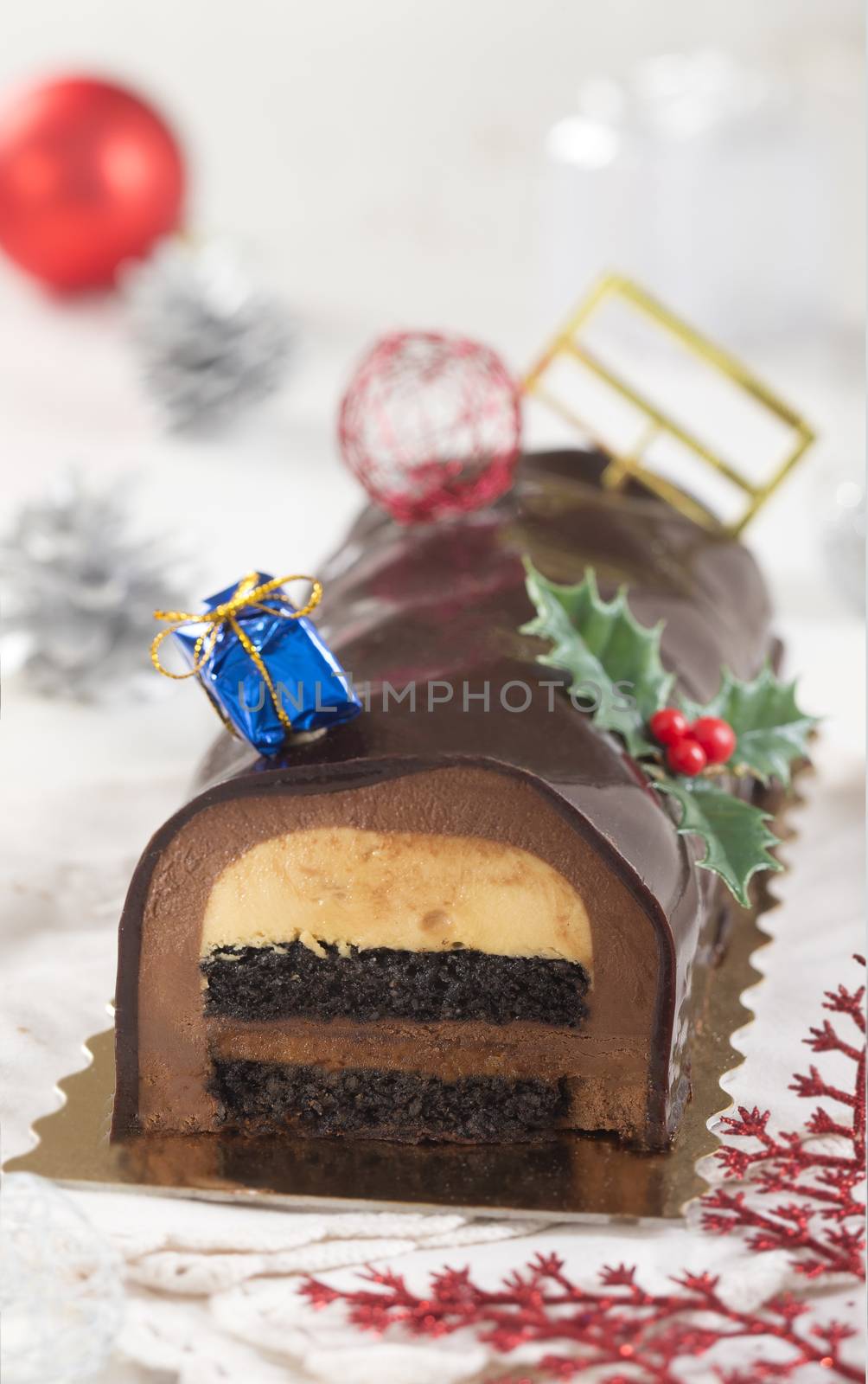 Christmas chocolate yule log cake with decoration