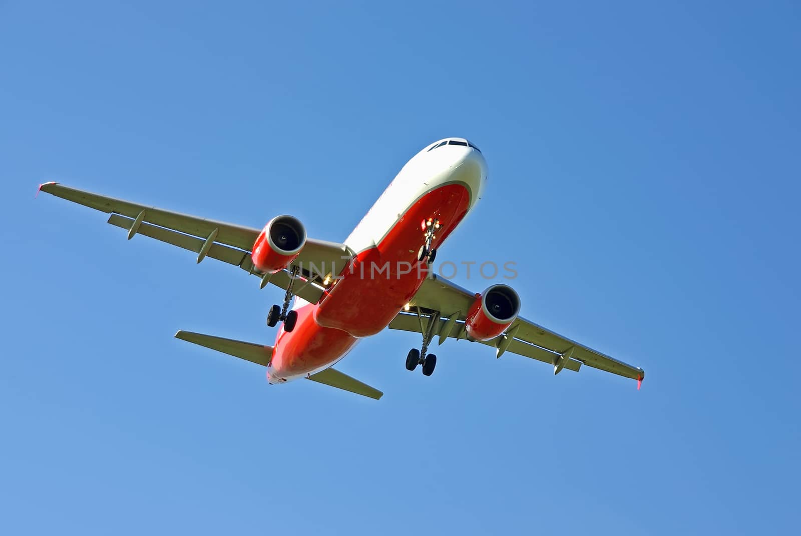 Red and white aircraft by JCVSTOCK