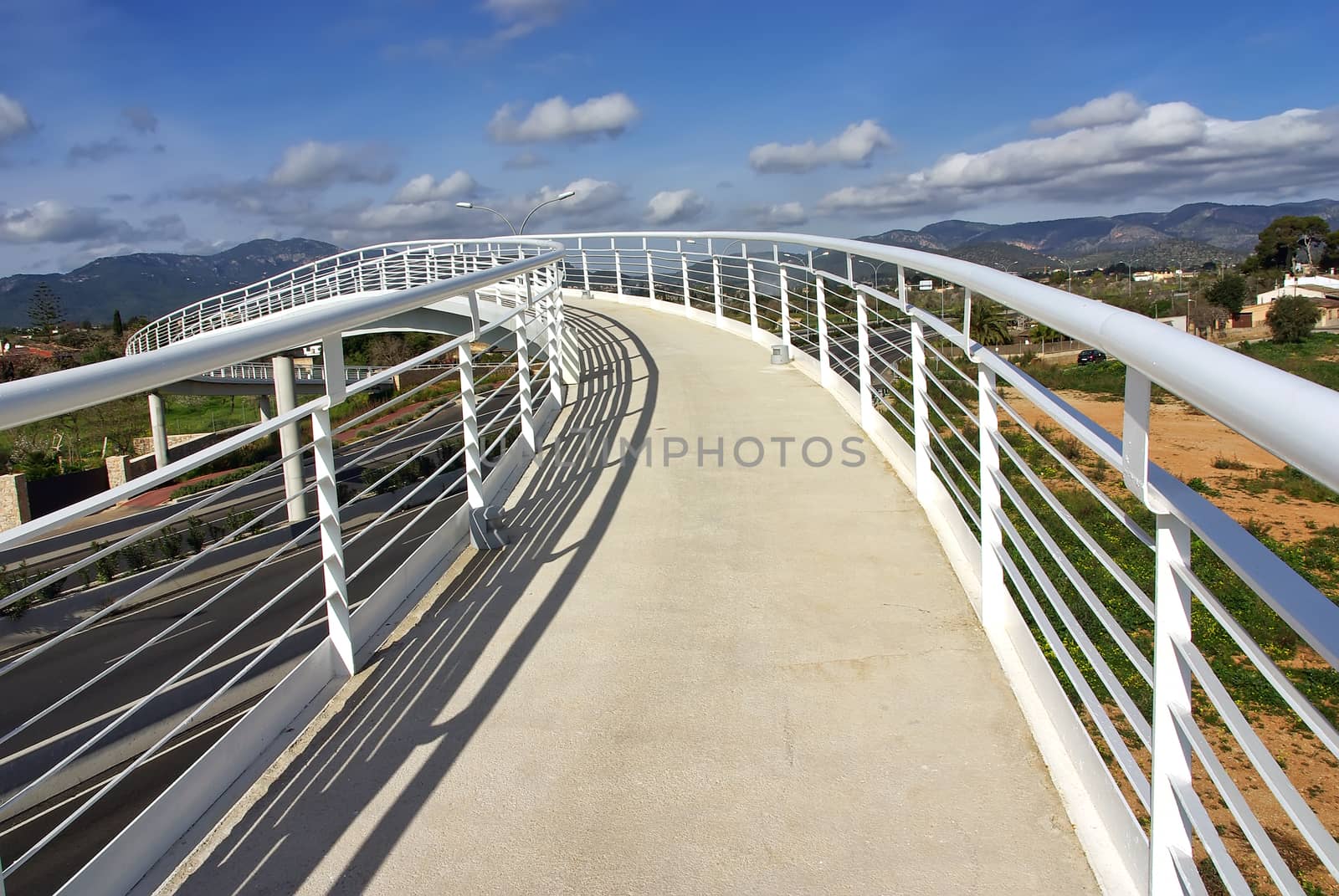 White pedestrian bridge over a highway in Majorca (Spain)