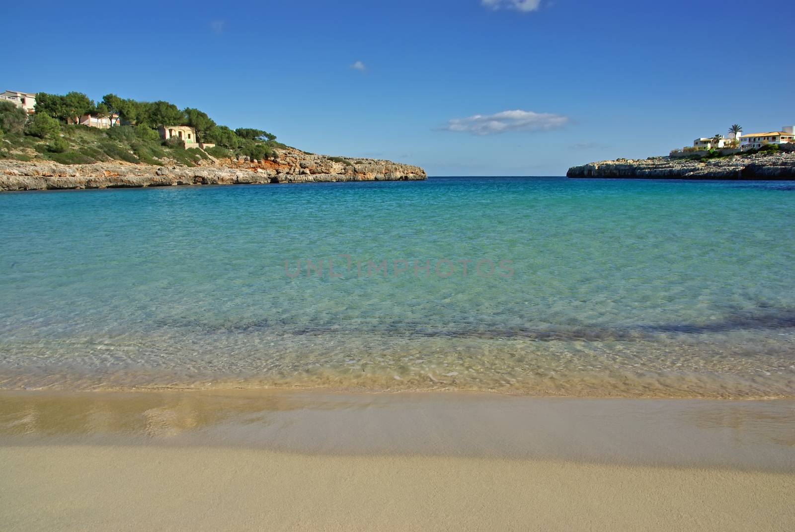 Blue water on the beach of Cala Marsal in Majorca (Spain)