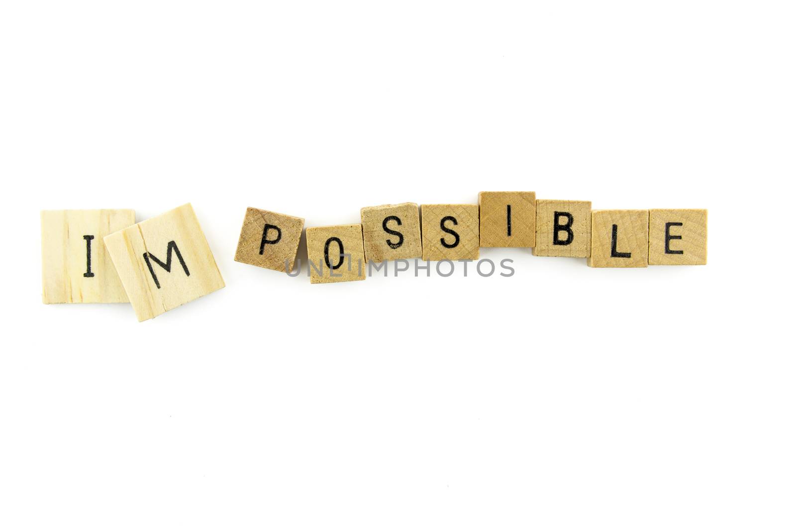 Impossible text on wooden cubes, isolated on white background by urubank