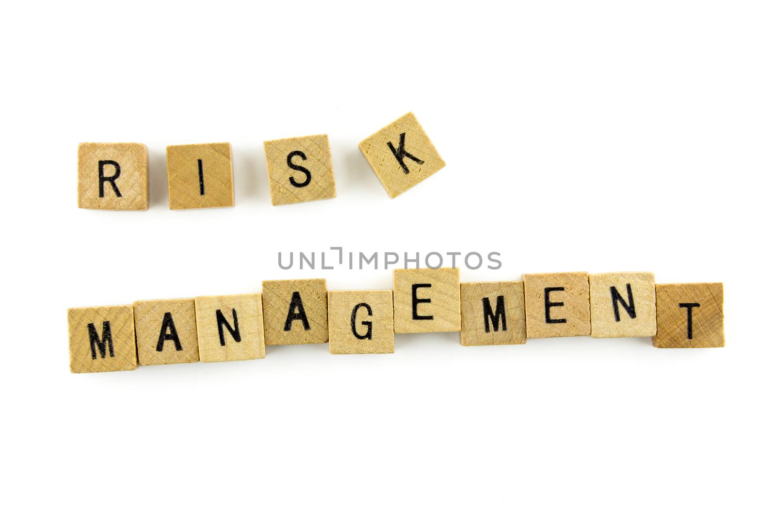 "RISK MANAGEMENT" text on wooden cubes, isolated on white backgr by urubank