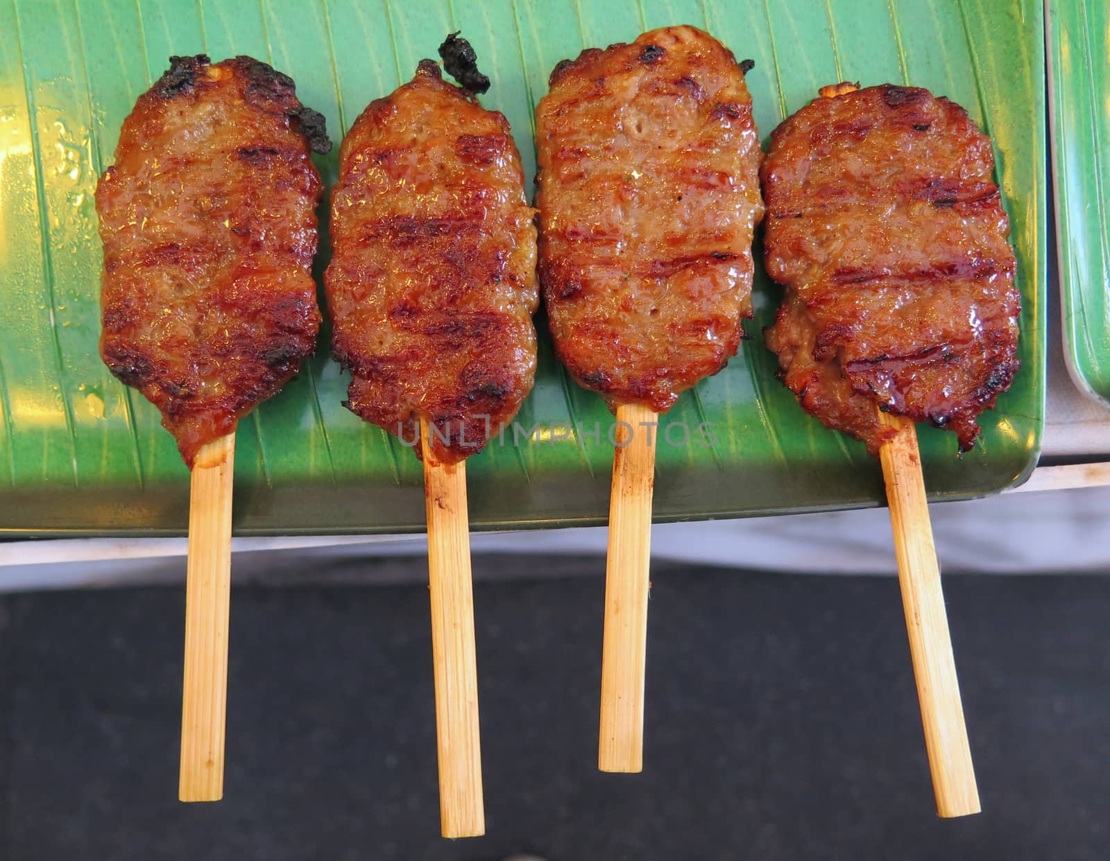 closed up the stick of thai roasted pork