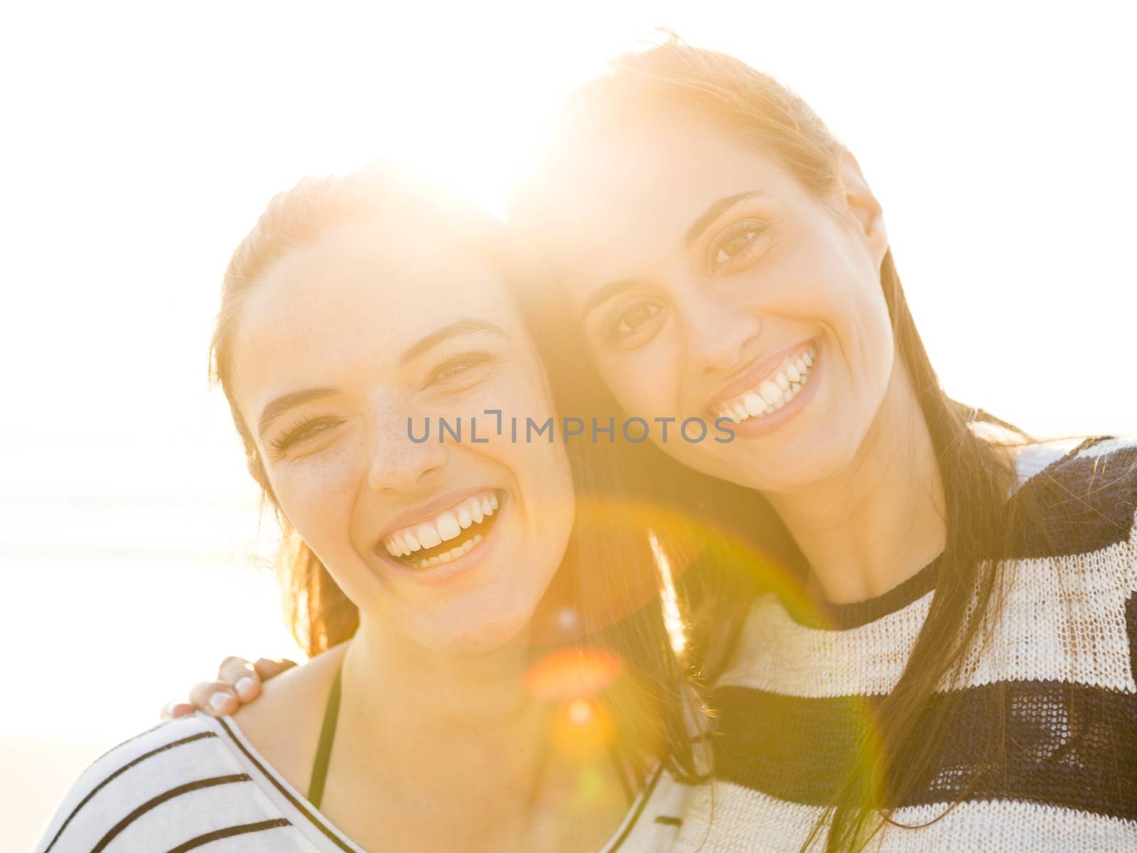 A portrait of best friends laughing 