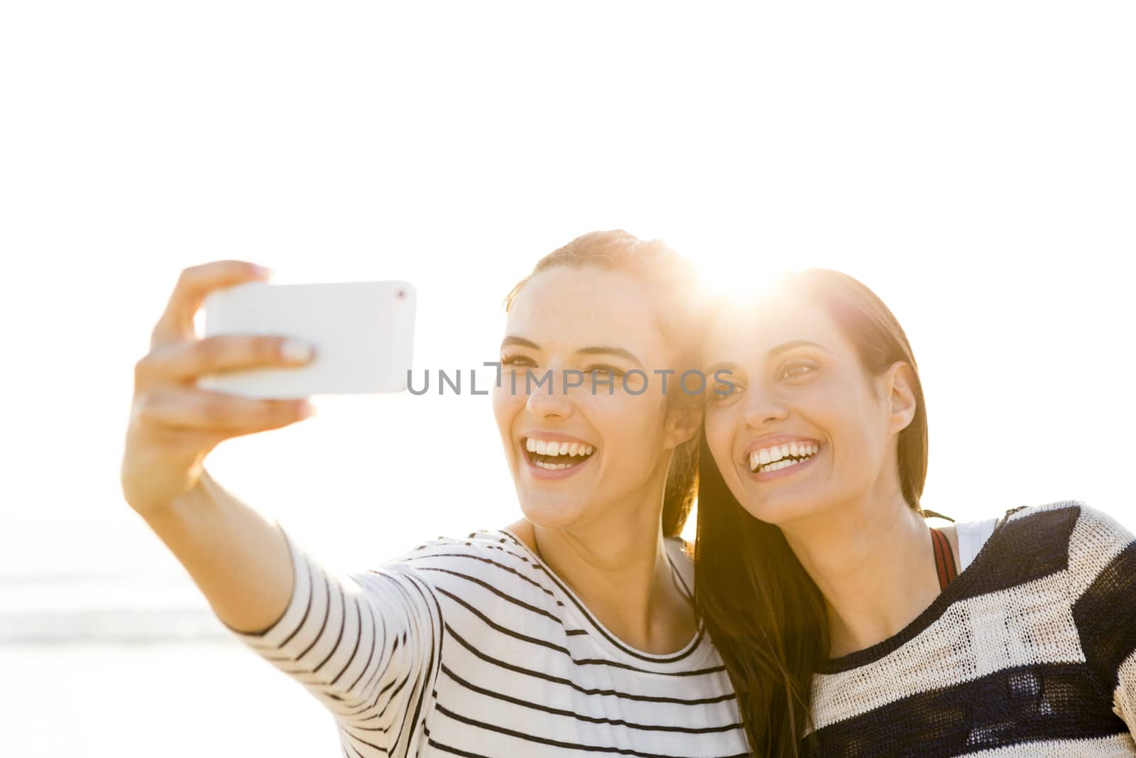 Best friends taking a selfie by Iko