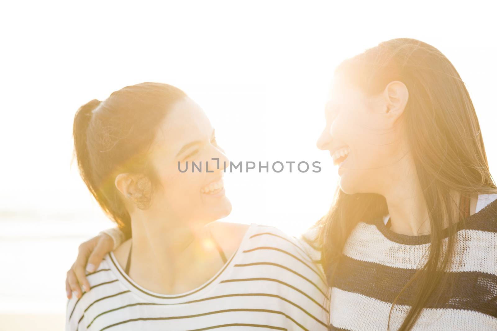 A portrait of best friends laughing 