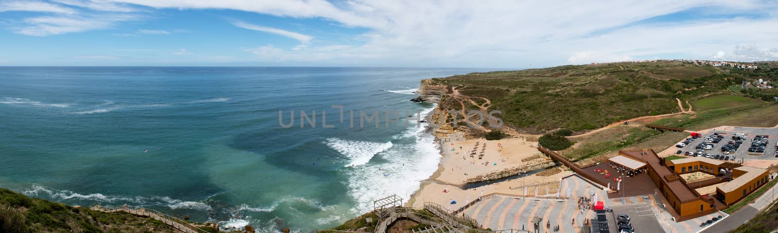 ERICEIRA, PORTUGAL - SEPTEMBER 7 2014: Ribeira d'Ilhas beach at Ericeira, Portugal is a popular destination for  tourists and surfers.