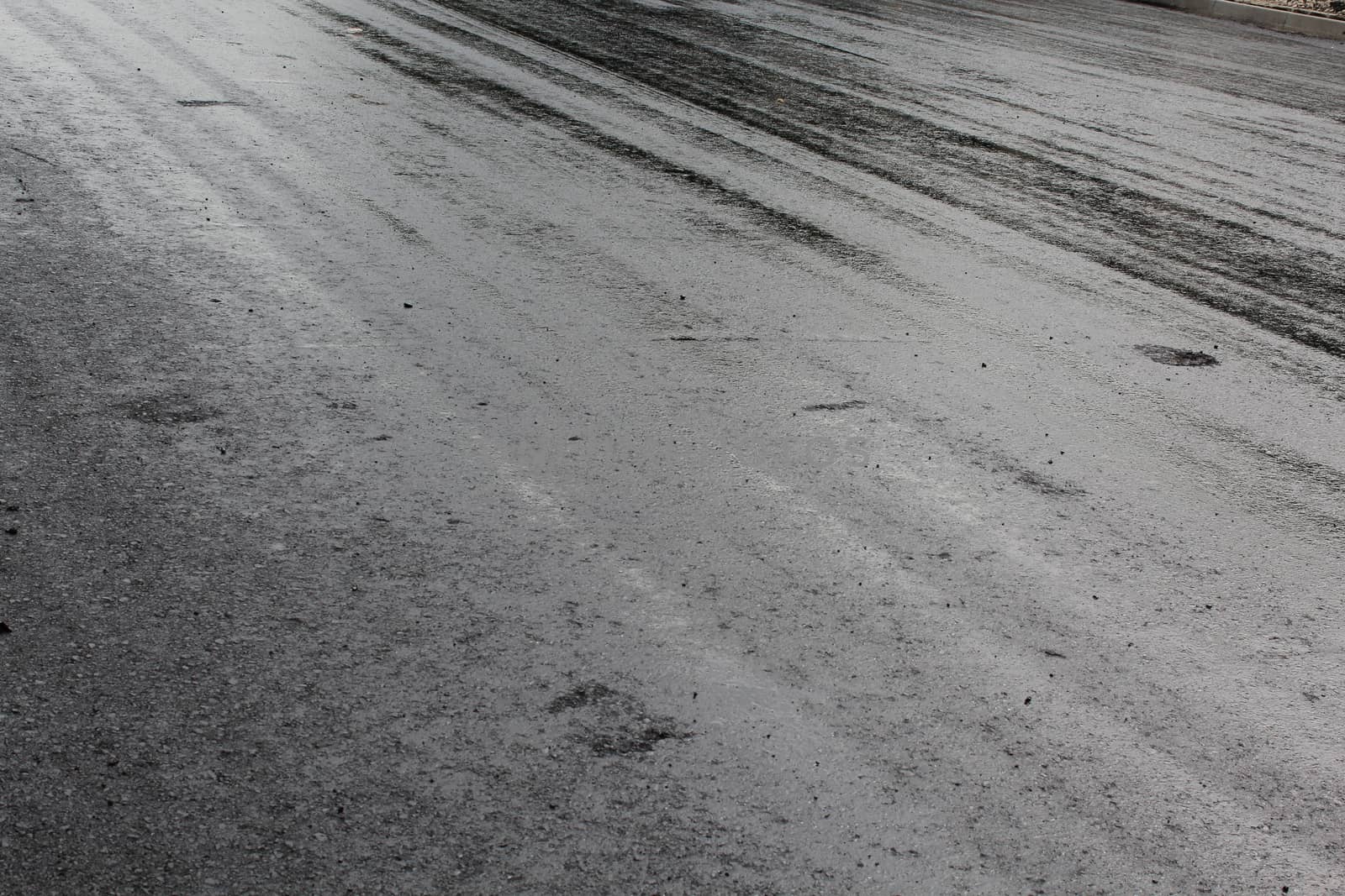 Freshly laid black tar asphalt pavement by nurjan100